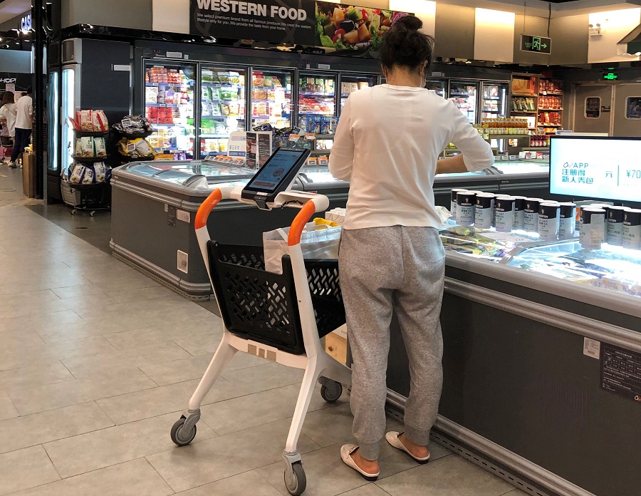 Shopping with a smart shopping cart using bar code scanner is full of fantastic